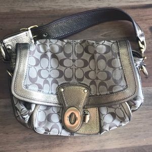 Coach gold logo purse with adjustable strap